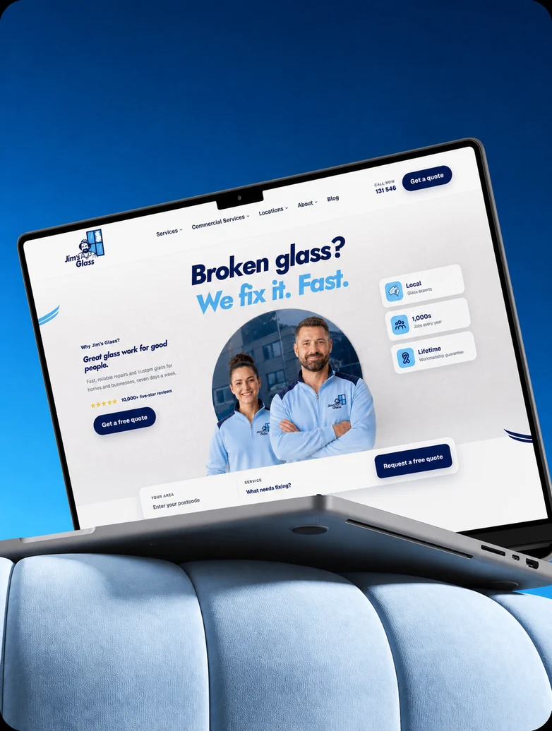 Jim's Glass website displayed on a laptop